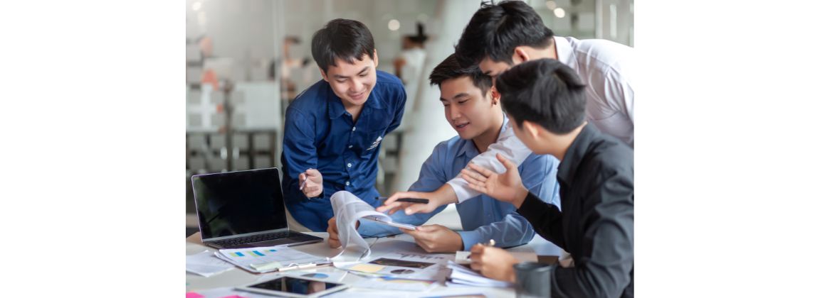 Tax officers reviewing work together
